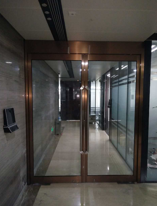 不锈钢玻璃地弹门