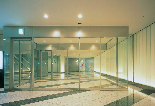 不锈钢玻璃地弹门