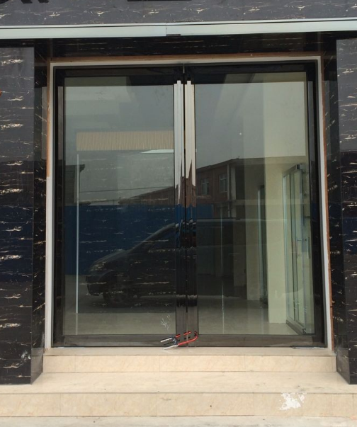 不锈钢玻璃地弹门