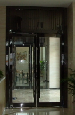 不锈钢玻璃地弹门