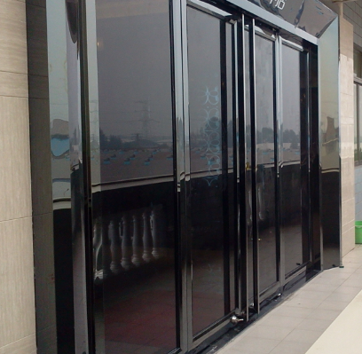 不锈钢玻璃地弹门